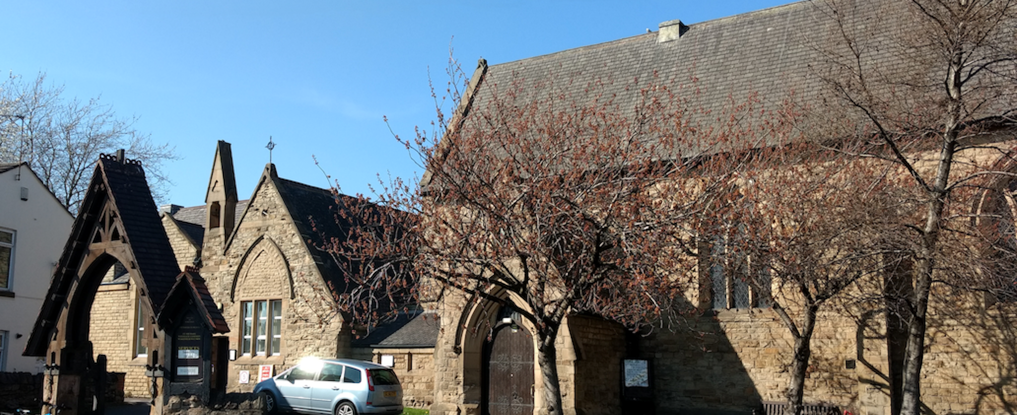 The outside of St Michaels Church in Wakefield on a bright, sunny day